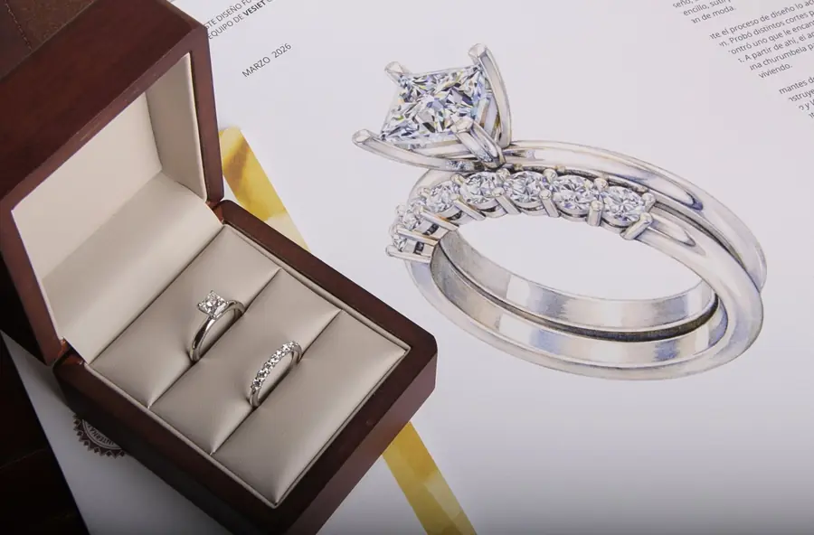Anillo y argolla en su caja VESIET junto a la ilustración a mano de su diseño